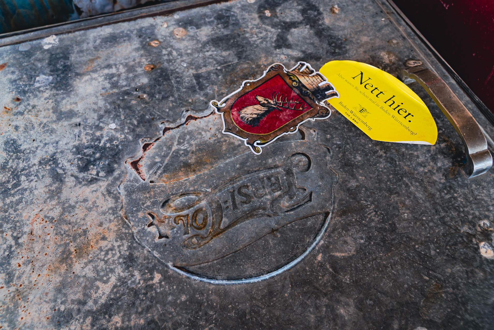 Baden-Württemberg sticker on a rusty Pepsi cooler at Hackberry General Store, Route 66, Arizona