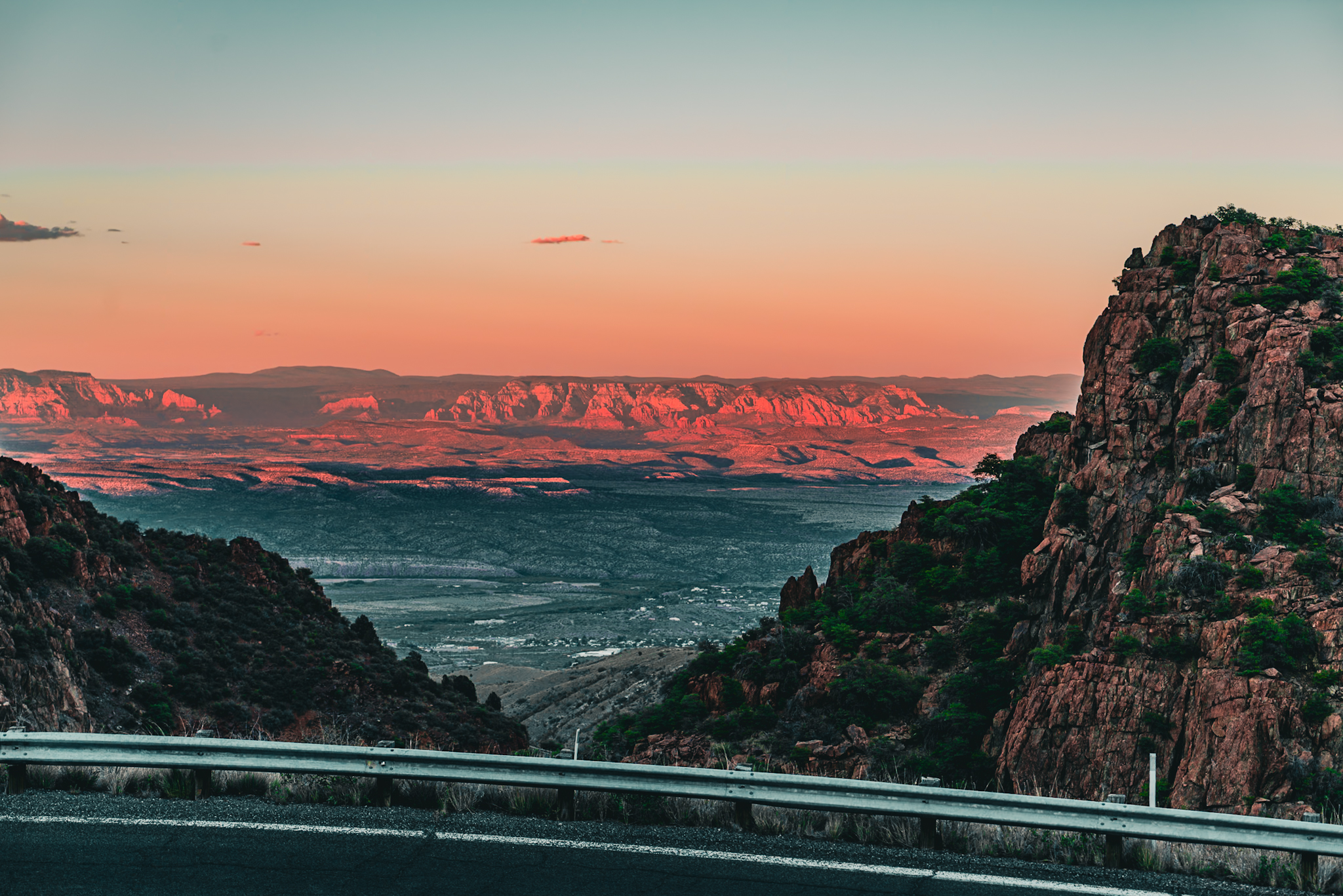 Sunset over the Verde Valley from Jerome, Arizona — 100 miles of red rock country glowing at dusk